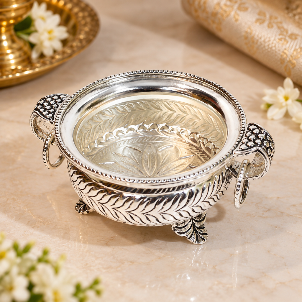 Small brass urli with silver-tone finish — full view