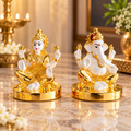 Swarna Rajat Shree Lakshmi Ganesh idol pair with light-toned bodies and gold-toned detailing.