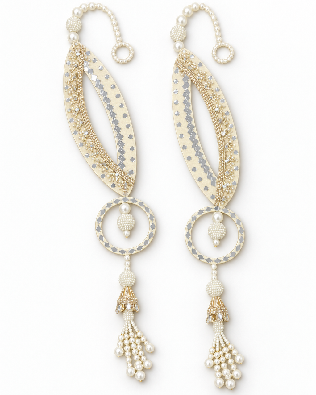 Handmade cream fish-eye latkans with reflective accents and pearl-like tassels