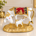 Divine Kamdhenu cow and calf marble polyresin figurine in ivory white, red, navy and gold