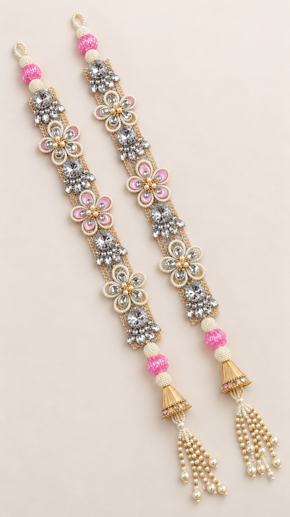 Handmade pink crystal latkan pair — elevated flatlay