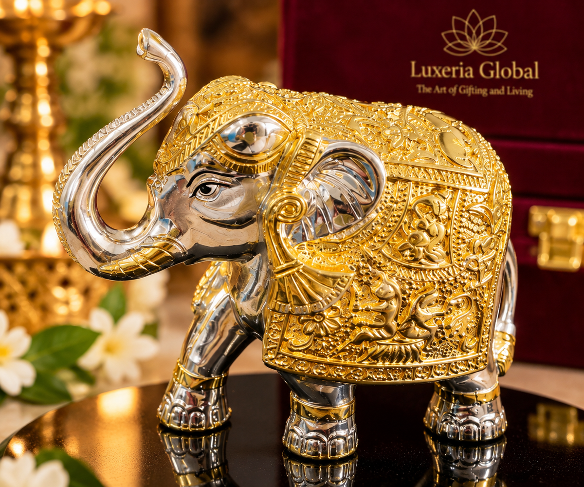 Gold and silver-polish elephant décor shown from an alternate angle