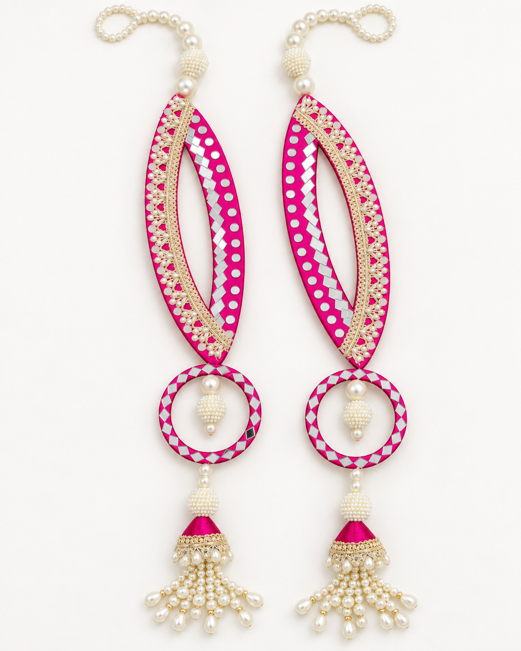 Handmade pink fish-eye latkans with reflective accents and pearl-like tassels
