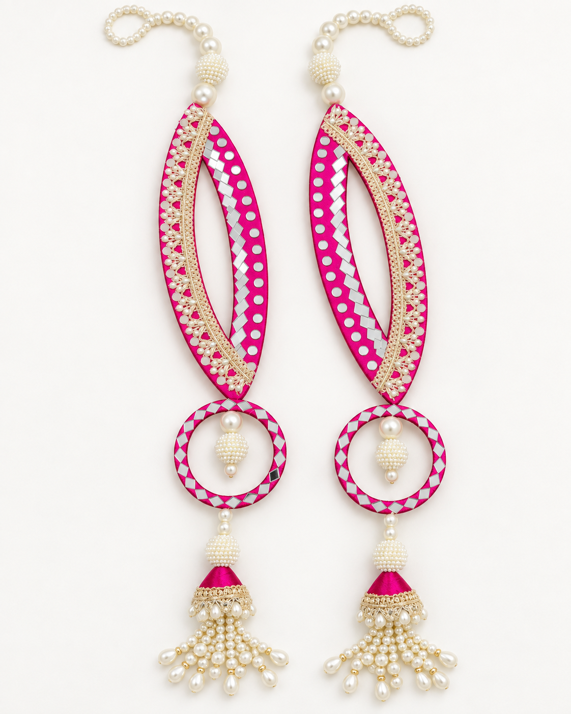 Handmade pink fish-eye latkans with reflective accents and pearl-like tassels