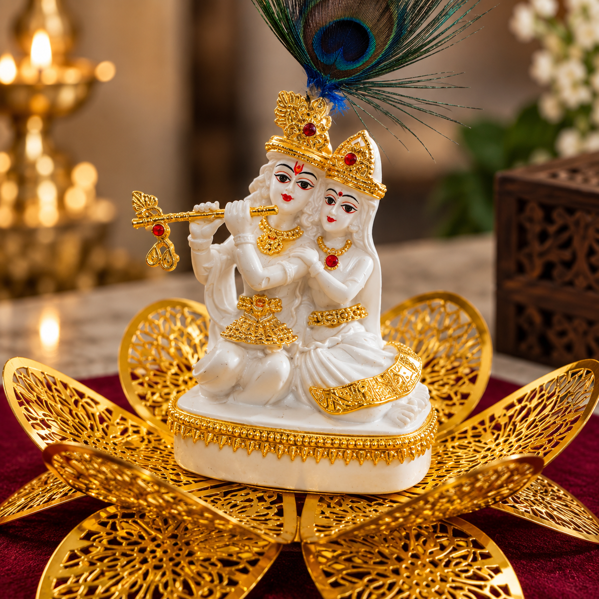 Radha Krishna lotus décor displayed beside a burgundy velvet wooden Luxeria Global gift box