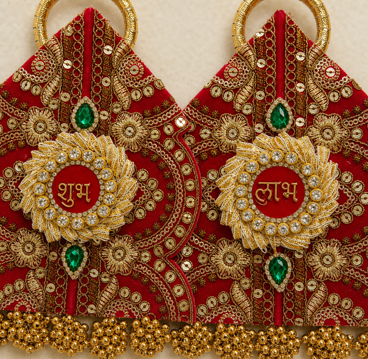 Close-up of embroidery and stonework on Shubh Labh hanging pair