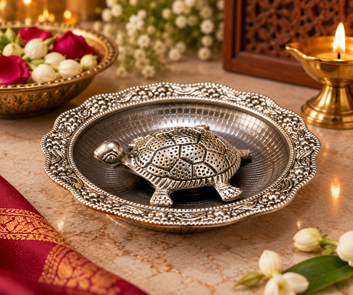 Silver-plated metal tortoise with decorative glass plate