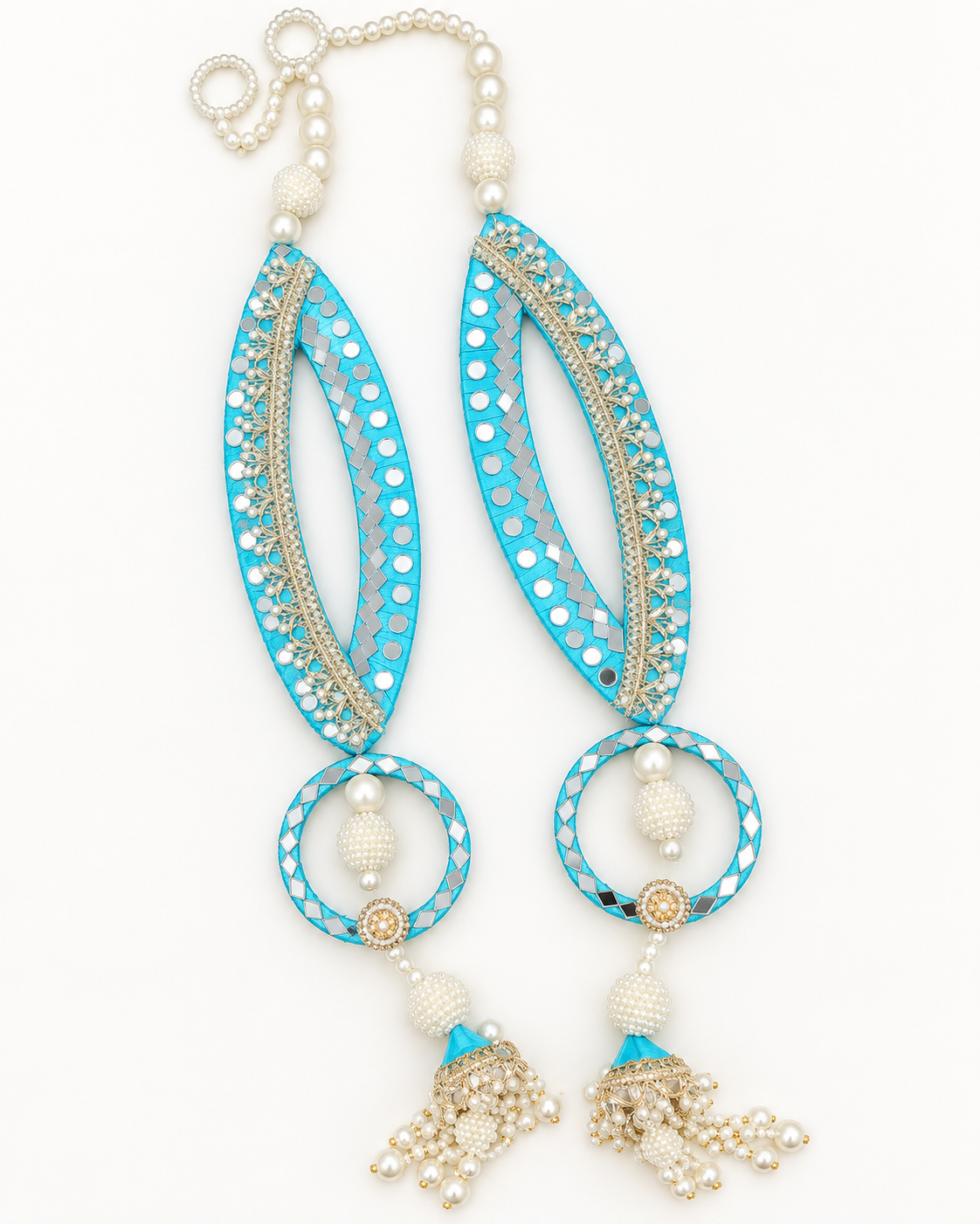 Handmade turquoise fish-eye latkans with reflective accents and pearl-like tassels